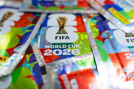 Official FIFA World Cup 2026 merchandise featuring holographic foil packaging and tournament trophy branding, soccer championship collectors item