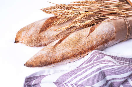 Freshly baked baguettes isolated on white background.の写真素材