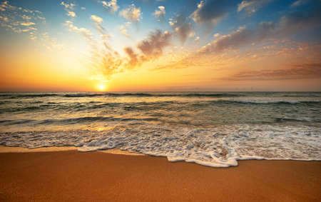 Landscape with sea sunset on beach.の写真素材