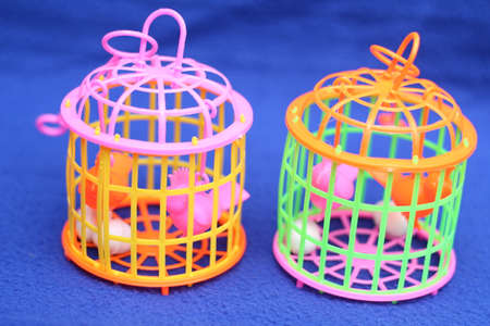 Two small baskets and children's toysの写真素材