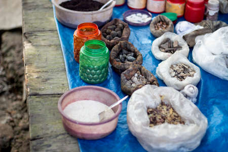 This is a herbal medicine shop. There are many types of small boxes and medicinal bran and stones that are made from treesの写真素材