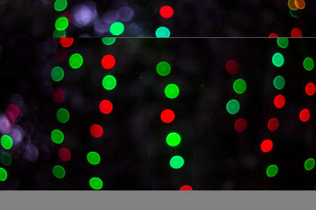 Colorful blur glow circles of light Isolated on black abstract background.の写真素材