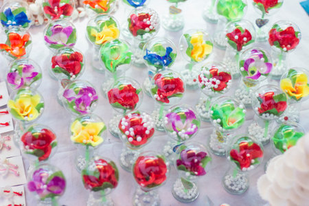 there is have various kinds of emitatioan flower and the background blur