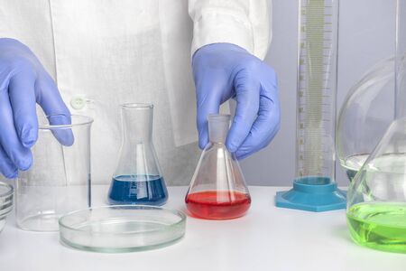 Hand of a scientific taking a sample tube test. Workplace lab assistantの写真素材