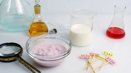 Food quality control inspecting at additives yogurt and milk in the laboratory.の写真素材