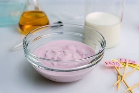 Food quality control inspecting at additives yogurt and milk in the laboratory. Close up.の写真素材
