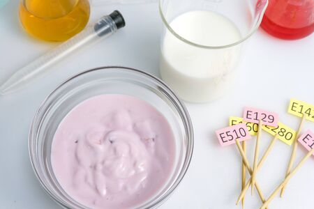 Food quality control inspecting at additives yogurt and milk in the laboratory. Top view.の写真素材