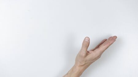 Open man hand on white background. Close up.の写真素材