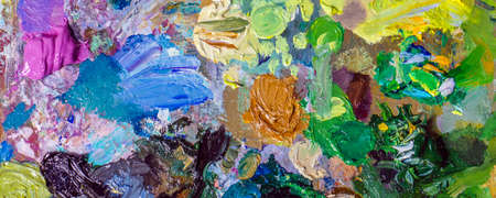 Photo Background image of bright oil-paint palette closeupの写真素材