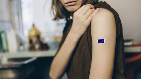 Photo Universal vaccination concept. The girl prepared her hand for an injection against  with the...