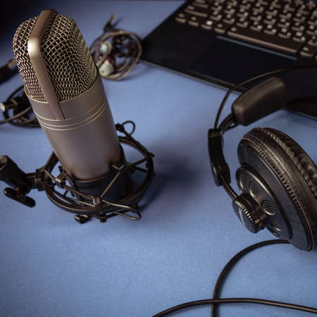 Photo Studio microphone, headphones, speakers and computer. Home studio recording for sound mixing, sound design and music production.の写真素材