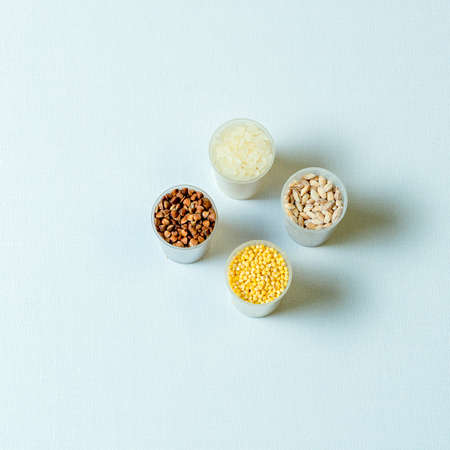 Millet, rice, buckwheat, pearl barley in the crops laboratory for food quality control of grain. Various varieties of cereals in a food laboratory.の写真素材