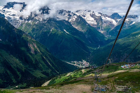 Photo travel to the region of the North Caucasus region - cable car from Mount Mussa-Achitara to the resort village of Dombay.の写真素材