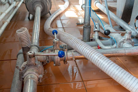 Dairy production. Details and accessories of the apparatus for bottling dairy products.