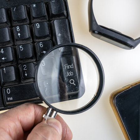 Close-up through a magnifying glass of a conceptual keyboard. Find Jobの写真素材