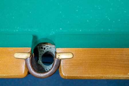 Russian billiards, an empty pocket on the table. View from aboveの写真素材