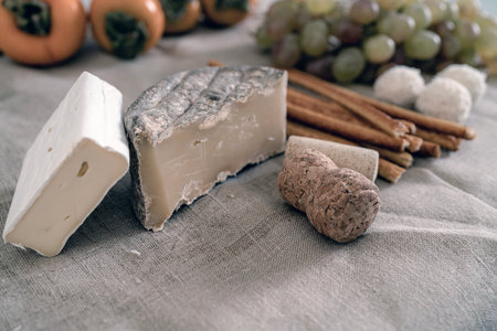 aged cheese and camembert close-up on tableの写真素材
