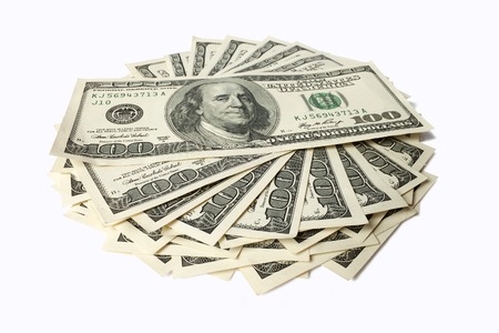 Heap of Dollars isolated on white background with place for yourの写真素材