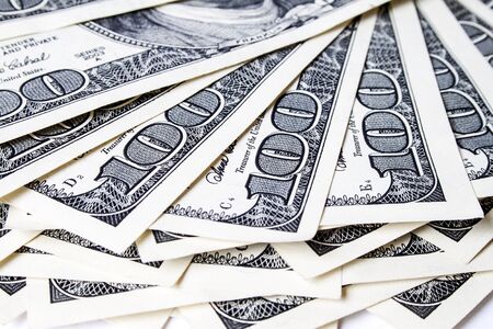 Heap of Dollars isolated on white background with place for your