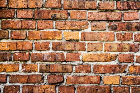 pattern gray color of modern style design decorative uneven cracked real stone wall surface with cementの写真素材