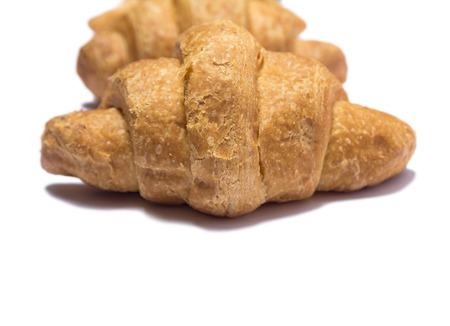 Croissant close up isolated on white background.の写真素材