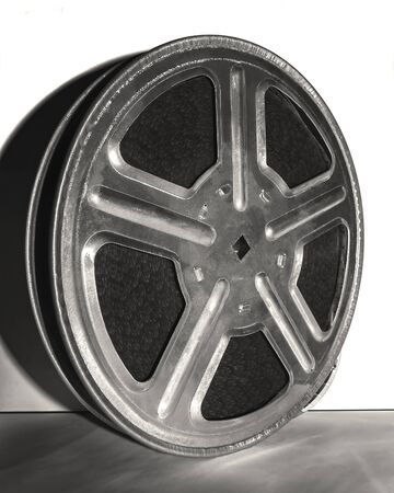 The coil of film on a gray background with shadowの写真素材