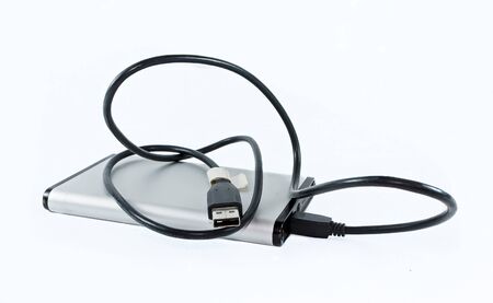 Storage device with connection cable on a white background