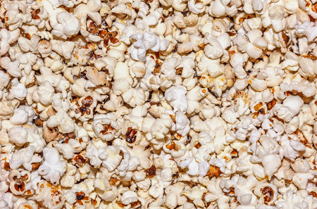 Background of white and the usual popcornの写真素材