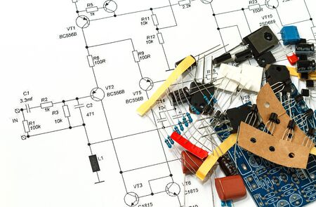 Details of an electronic device with a printed circuit board and an electrical circuit on a white backgroundの写真素材