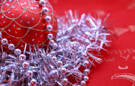 Christmas ball and decoration in red backgroundの写真素材