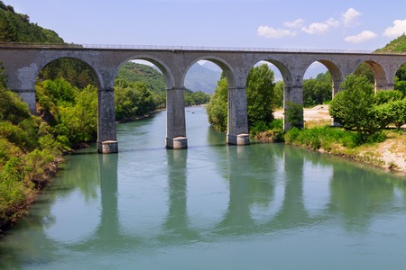 Bridge and river in the alps in Franceの写真素材