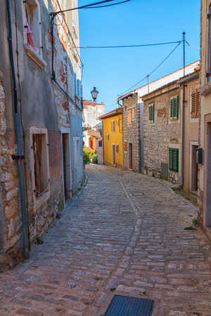 Calm, peaceful little tight narrow streets and colorful houses of Rovinj town in Croatia Europeの写真素材