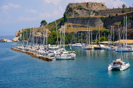 Beautiful island of Corfu and old fortress in the foreground of the wonderful blue sea in Greece ( Kerkyra )のeditorial素材