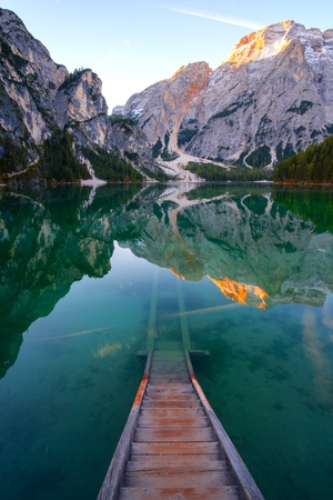 Beautiful Braies lake and house in the background of Seekofel mountain in Dolomites,Italy ( Pragser Wildsee )の写真素材