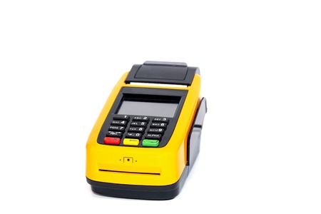 Yellow credit card reader terminal on isolated background. Easy payment method.
