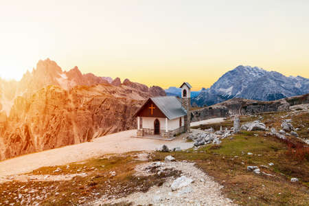 Famous Dolomites giant mountains peaks, and chapel near Drei Zinnen  ( Tre Cime di Lavaredo) the South Tyrol in Italyの写真素材