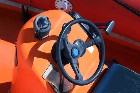Steering wheel of a motor boatの写真素材