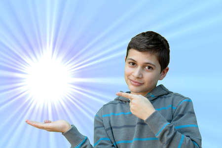 Boy pointing to copyspaceの写真素材
