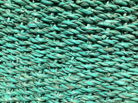 Green wooden plaiting details and backgroundの写真素材