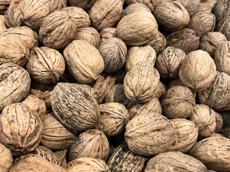 Natural Italian nuts on table. Street market. Background and graphic