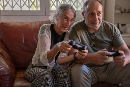 Retired older couple spending time together at homeの写真素材