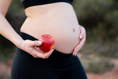 Pregnant women and a healthy diet for fetal nutrition. Healthy lifestyle during maternityの写真素材