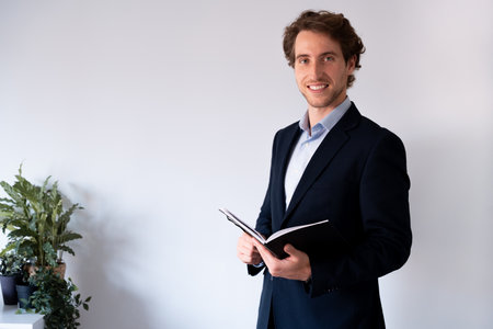 Open work planner with handwritten notes. Representation of strategy and personal management.の写真素材