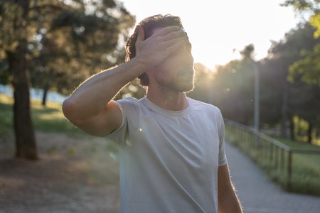 Fitness man looks tired after physical trainingの写真素材