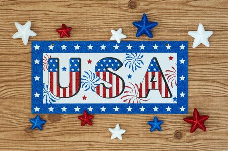 Independence Day July 4th, President's Day, Memorial Day, Labor Day, Veteran's Day, Great America. USA sign in the colors of the flag of the United States on a wooden background with stars.の写真素材