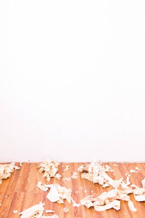 Apartment during the repair. Wallpaper removed from the wall. Part of the wallpaper is stripped. Place for textの写真素材