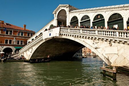 Venice, Italy - October 22, 2011: The Rialto Bridge crowded with tourists on a sunny October day.のeditorial素材