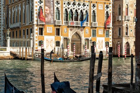 Venice, Italy - October 22, 2011: Historic Palazzo Cavalli-Franchetti and famous Grand Canal on a sunny afternoon.のeditorial素材