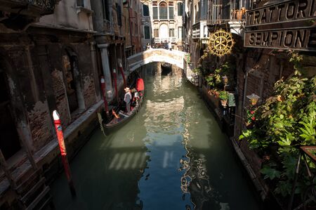 Venice, Italy - October 22, 2011: Gondola waiting at a small hotelのeditorial素材