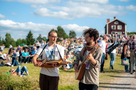 Bingsjo, Sweden - July 3, 2013: The annual traditional folk music festival in Bingsjo held on the first Wednesday in July is one of the most famous in Sweden and attracts thousands of musicians and visitors.のeditorial素材